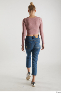 Kate Jones  1 back view blue jeans casual dressed…